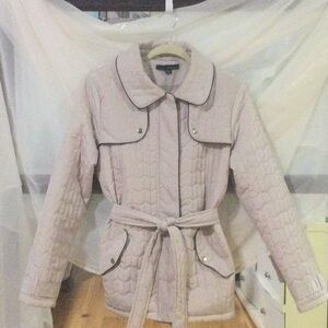 Cute beige jacket with dark brown trim